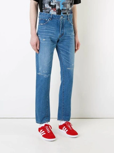 Shop Taakk Tapered Cropped Jeans In Blue