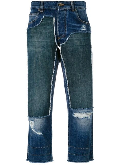 Shop Dolce & Gabbana Cropped Patch Jeans - Blue