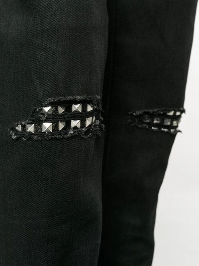 Shop Saint Laurent Ripped Stud Slim Fit Jeans In Black