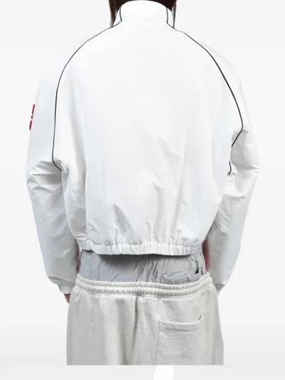 EXAGGERATED-SHOULDER TRACK JACKET