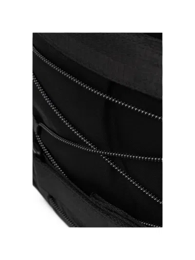 Doughnut Small Roaming Ripstop-texture Buckle-strap Backpack In Black
