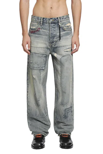 Dagger Distressed Patchwork Jeans In Blue