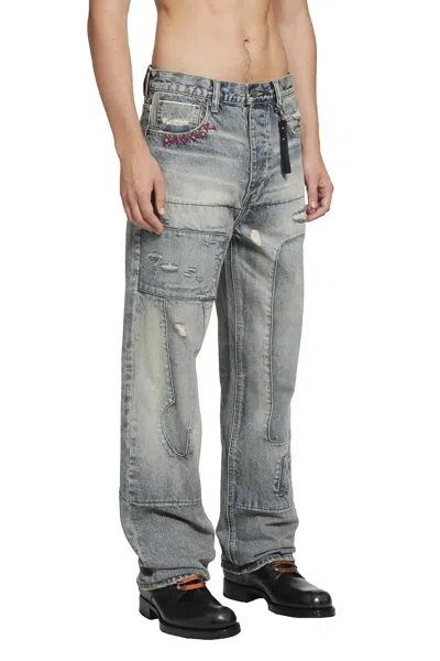 Dagger Distressed Patchwork Jeans In Blue