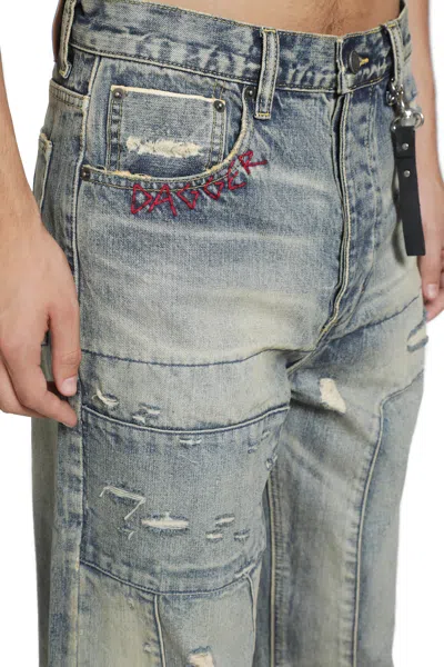 Dagger Distressed Patchwork Jeans In Blue