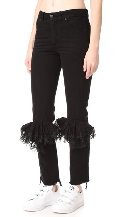 Preen By Thornton Bregazzi Ruffle Knee Flared Jeans In Black