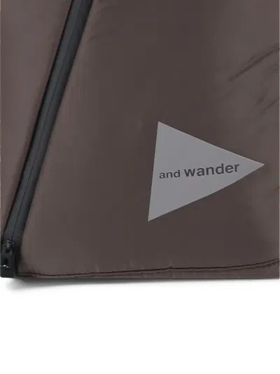 And Wander Diagonal-zip Drawstring Backpack In Brown
