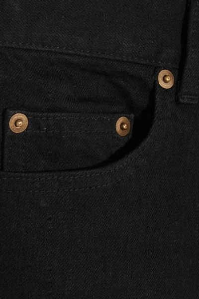 Shop Saint Laurent Frayed High-rise Flared Jeans
