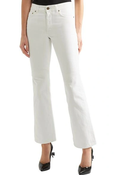 Shop Saint Laurent Cropped High-rise Flared Jeans