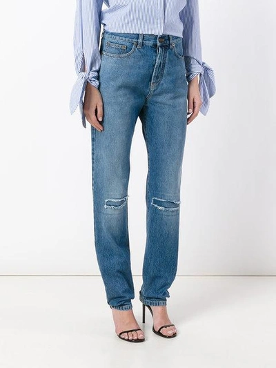 Shop Saint Laurent Slim Fit Knee Hole Jeans - Blue