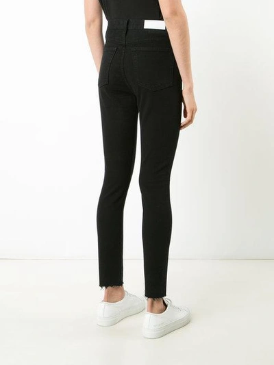 Shop Re/done High Waisted Fray Jeans In Blue