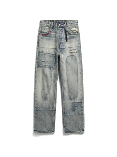 DISTRESSED PATCHWORK JEANS