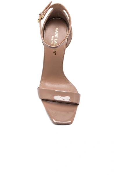 Shop Saint Laurent Patent Amber Ankle Strap Heels In Neutrals, Pink.  In Nude Pink