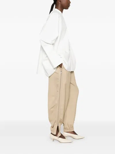 Co Side-zip Elasticated Trousers In Neutral