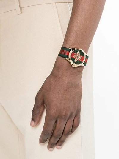 Shop Gucci Bumblebee Fabric Strap Watch In Red