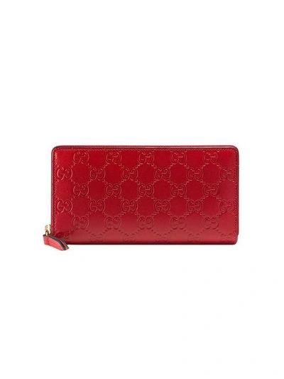 Shop Gucci Signature Zip Around Wallet