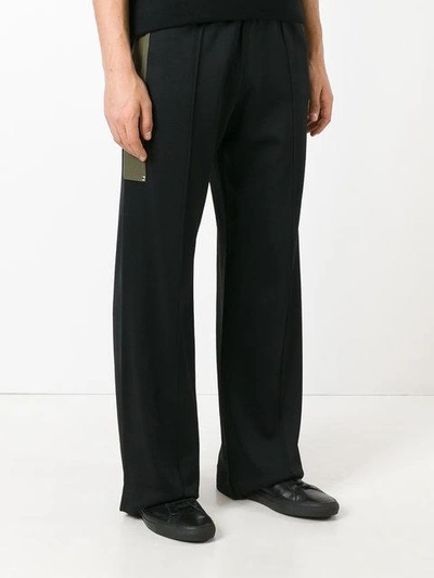 Shop Givenchy Side Stripe Track Pants - Black
