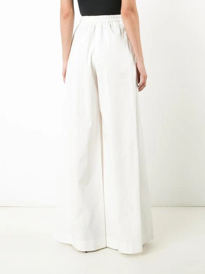 Shop Tome Flared Trousers - White