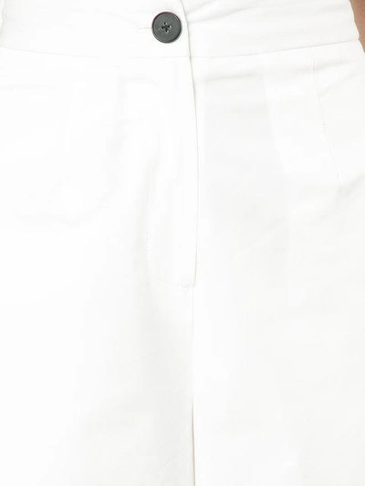 Shop Tome Flared Trousers - White