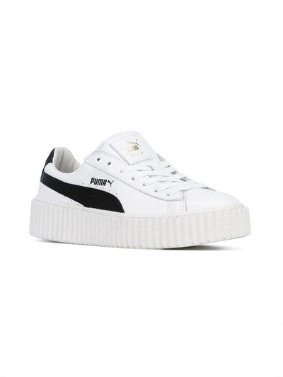 Shop Puma Lace-up Sneakers In White
