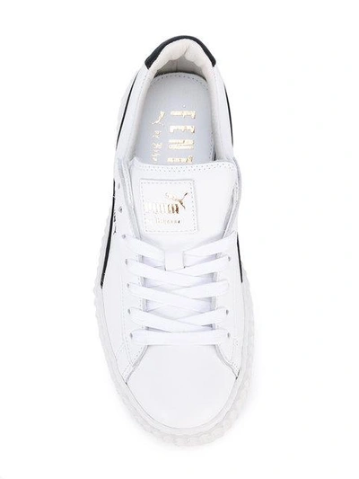 Shop Puma Lace-up Sneakers In White