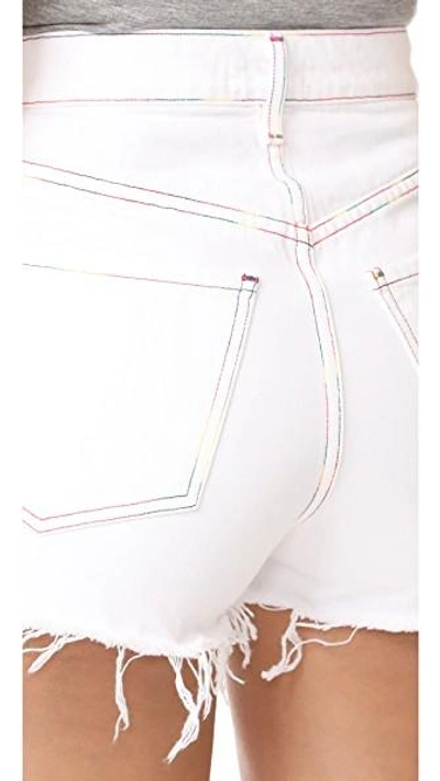 Shop Agolde Jaden High Rise Cutoff Shorts In White Space