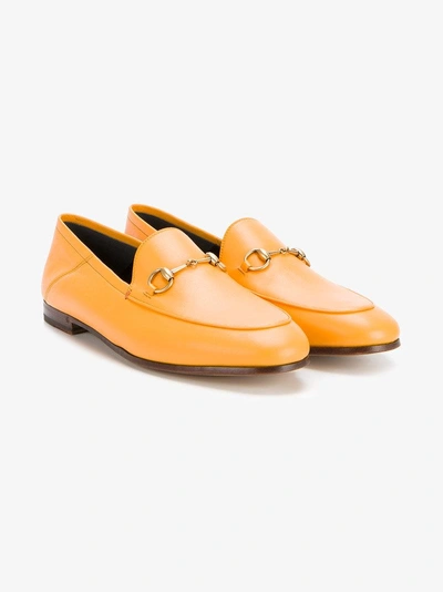 Shop Gucci Yellow Brixton Horsebit Loafers In Yellow & Orange