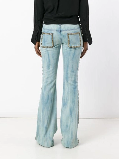 Shop Gucci Studded Flared Jeans - Farfetch In Blue