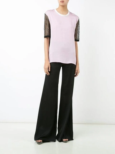 Shop Vionnet High-rise Flared Trousers In Black