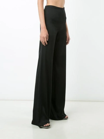 Shop Vionnet High-rise Flared Trousers In Black