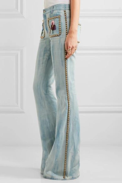 Shop Gucci Studded Embroidered Mid-rise Flared Jeans In Mid Denim