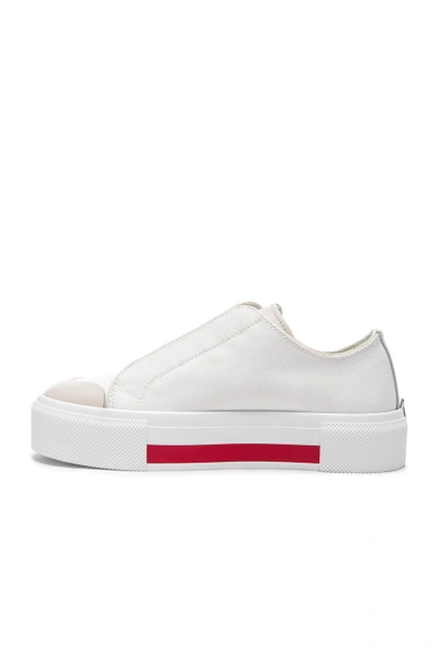 Shop Alexander Mcqueen Canvas Platform Slide Sneakers In White