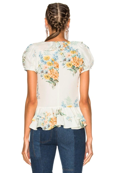 Shop Alexander Mcqueen Printed Ruffle Blouse In Blue, Green, Floral, Orange, White. In Ivory