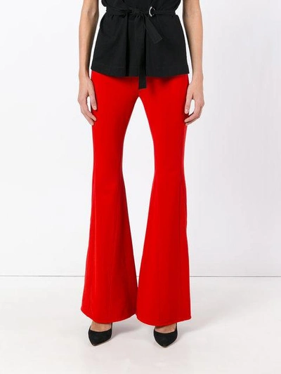 Givenchy Flared Crepe Trousers In Red