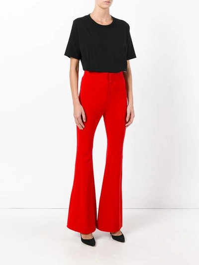 Givenchy Flared Crepe Trousers In Red