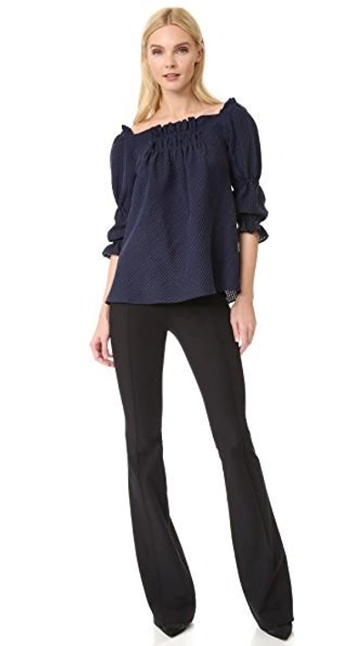 Shop Veronica Beard Hibiscus Flare Pants In Black