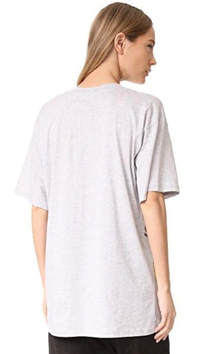 Shop Moschino Oversize T Shirt In 灰色混色