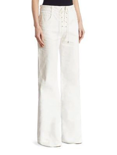 Shop Chloé Lace-up Denim Wide-leg Pants In White