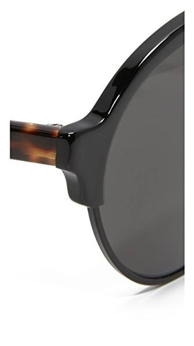 Shop Illesteva Milan Iii Sunglasses In All Black Tortoise/grey