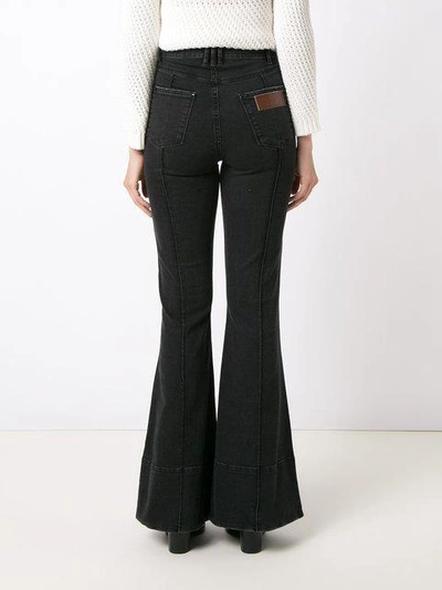 Shop Amapô High Waist Flared Jeans - Black