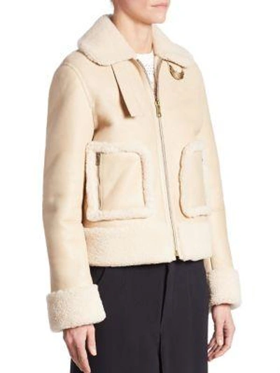 Shop Chloé Cropped Shearling Jacket In Beige-white