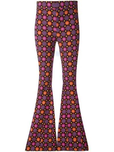 Shop Givenchy Psychedelic Print Flared Trousers - Pink