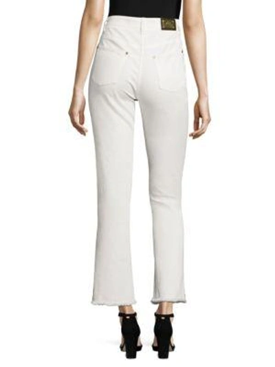 Shop Etro Embroidered Flared Jeans In White
