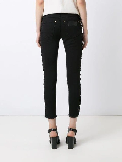 Shop Amapô Side Lace Up Skinny Jeans In Black
