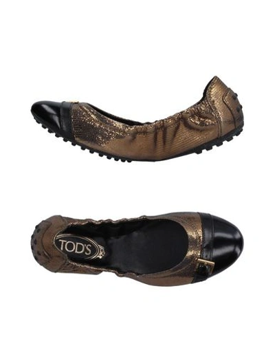 Tod's Ballet Flats In Gold