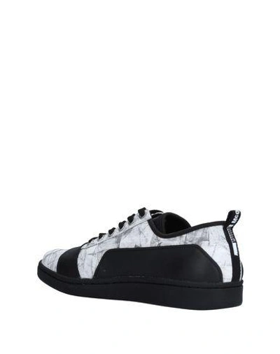 Shop Mcq Puma Sneakers In White