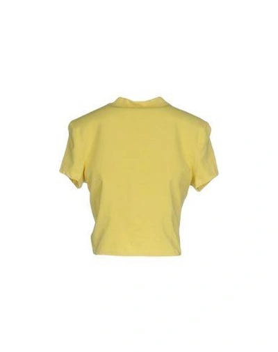 Shop Cheap Monday T-shirts In Yellow