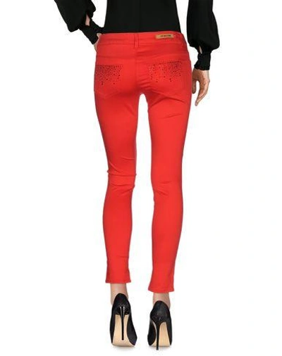 Shop Love Moschino Casual Pants In Red