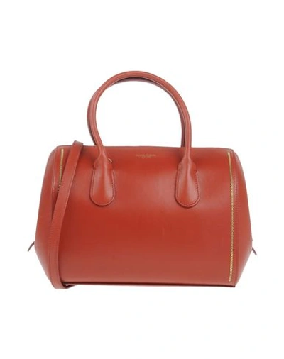 Nina Ricci Handbags In Rust