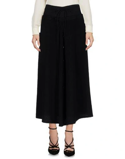 Shop Y's 3/4 Length Skirts In Black