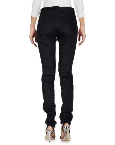 Shop Saint Laurent Denim Pants In Black